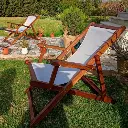 Chaise longue pliante en bois avec toile blanche – Confort jardin et plage marchinettn.webp